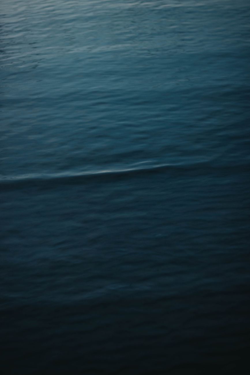 Ultramarine ocean water meeting the light near the surface
